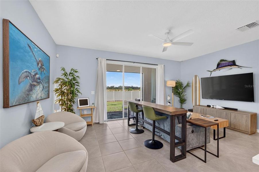 Furnished interior view inside a new home in Mangrove Point, Apollo Beach (Image 11).