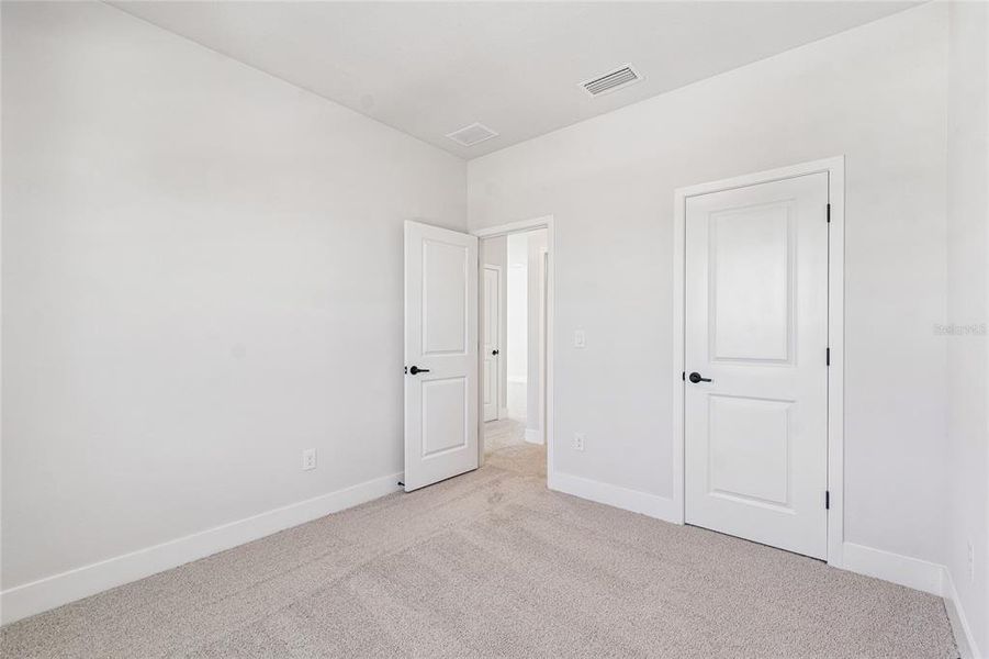Spacious, unfurnished interior of a new home in Persimmon Park - Garden Series, Wesley Chapel (Image 17).