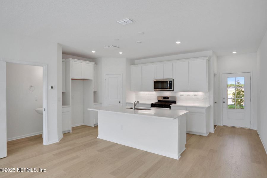 Furnished interior view inside a new home in , St. Augustine (Image 11).