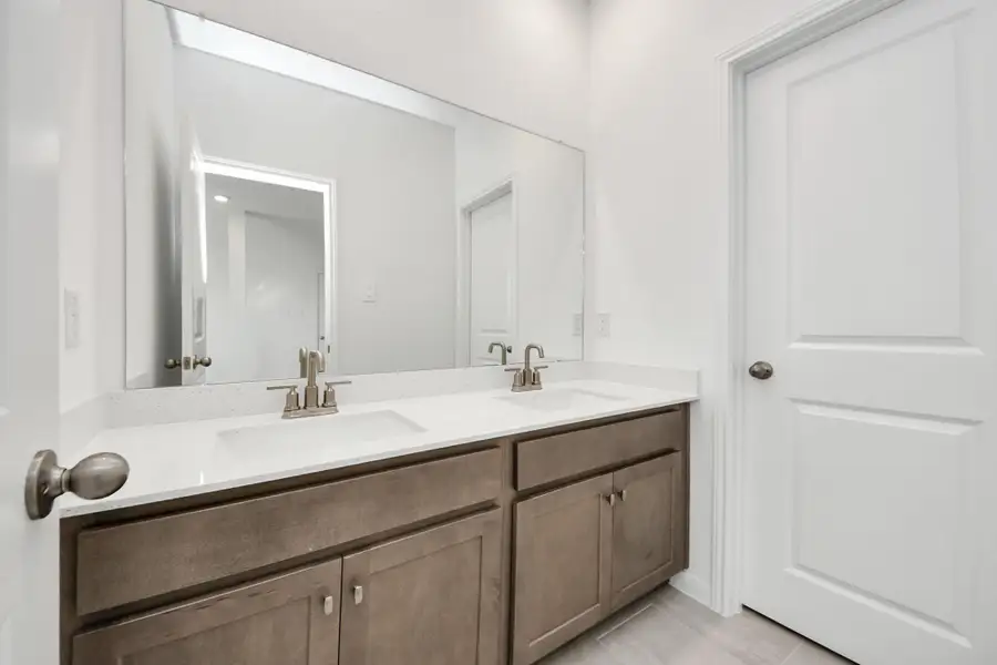 Furnished interior view inside a new home in Sunterra: Landmark Collection, Katy (Image 6).