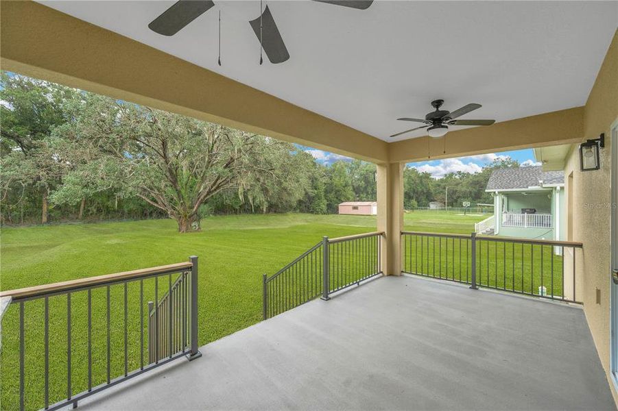 Exterior details and patio area of a home in , Dade City (Image 25).
