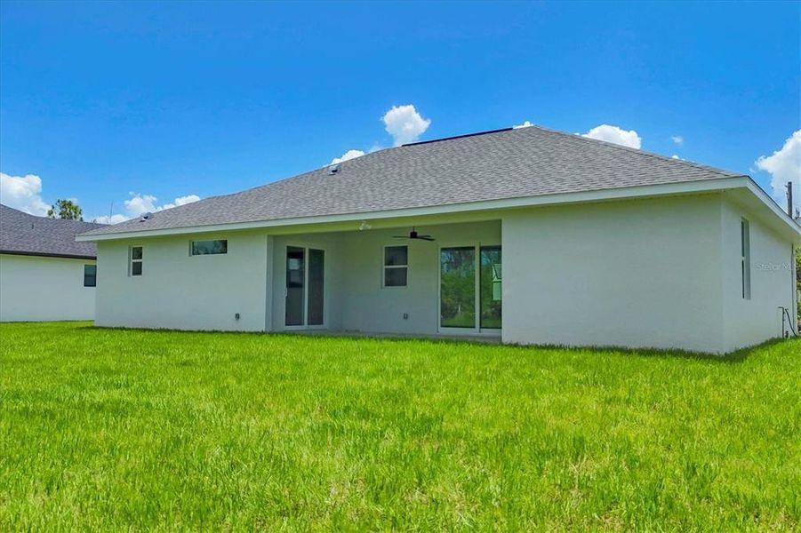 Front exterior of a new home in , Port Charlotte, FL, highlighting curb appeal (Image 22). Front exterior of a new home in , Port Charlotte, FL, highlighting curb appeal (Image 22).