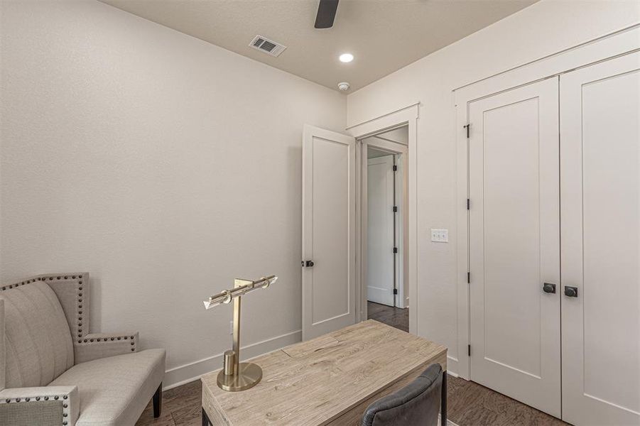 Office space with dark wood-style floors, a ceiling fan, and recessed lighting