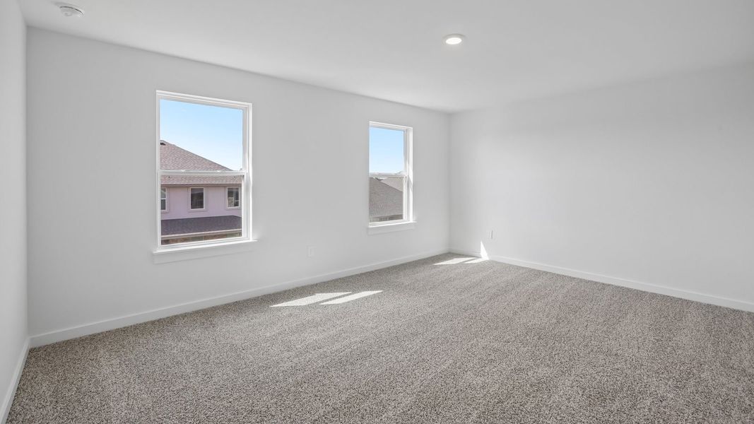 Spacious, unfurnished interior of a new home in Rosenbusch Ranch, Leander (Image 48).