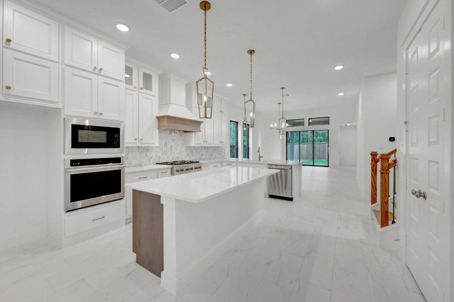 Furnished interior view inside a new home in The Highlands - Grove Collection, Porter (Image 6).
