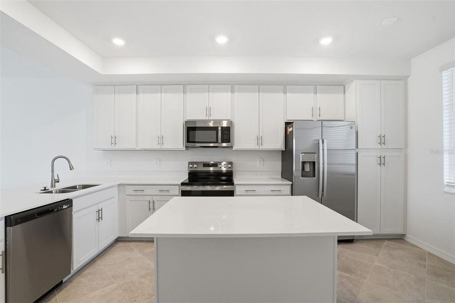 Furnished interior view inside a new home in Wellen Park Golf & Country Club, Venice (Image 12).