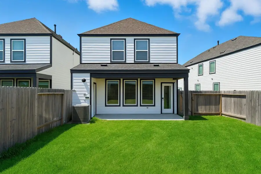 Imagine relaxing outside with your morning coffee, grilling, or entertaining friends and family in your own spacious backyard. (Digitally improved).