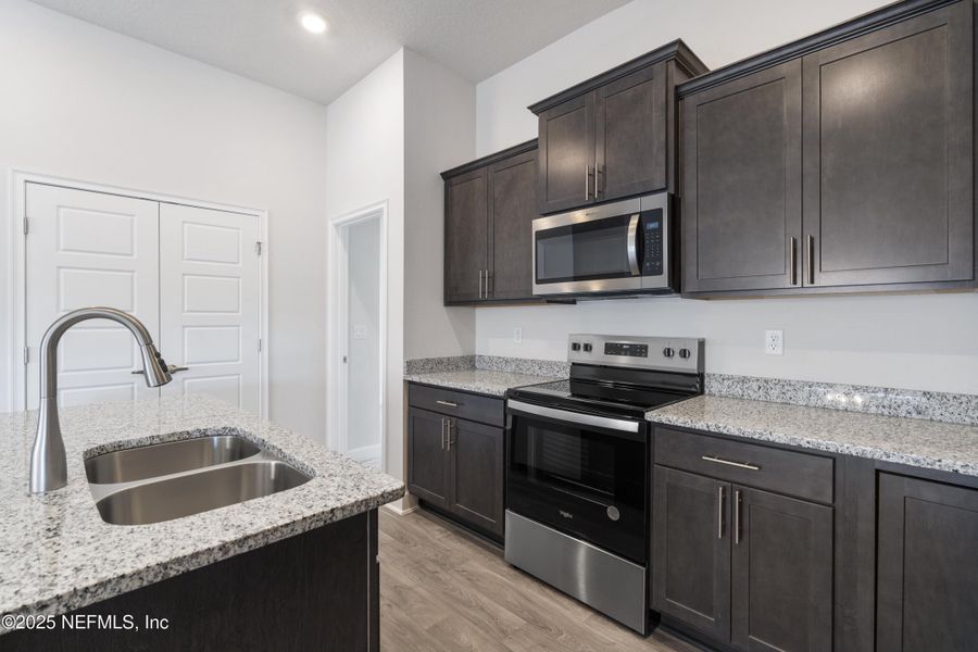 Furnished interior view inside a new home in Shadow Crest at Rolling Hills, Green Cove Springs (Image 5).