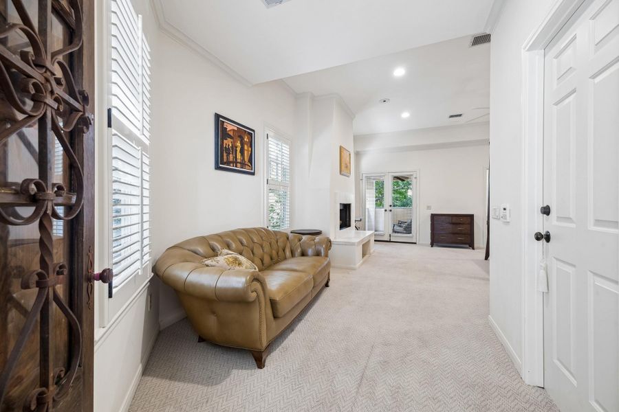 Didn"t know what to do with this couch !!  The Primary Bedroom holds so much furniture ! This is actuall an area that serves two purposes ... office area-dressing area- ...and the natural light lights up this room ....but too heavy for me to carry down !!!