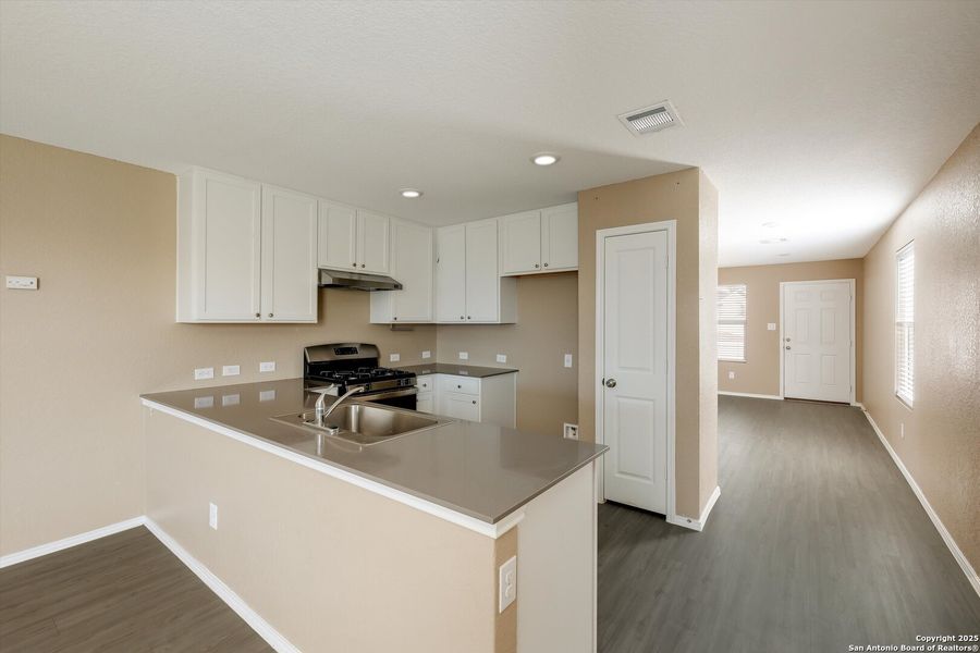Furnished interior view inside a new home in , San Antonio (Image 9).
