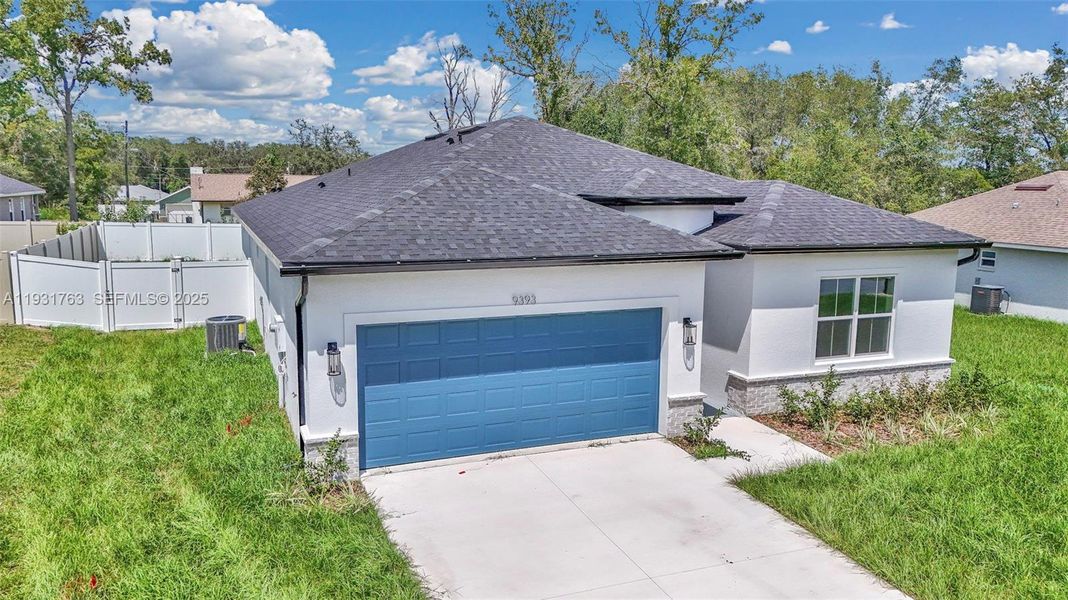 Front exterior of a new home in , Summerfield, FL, highlighting curb appeal (Image 18). Front exterior of a new home in , Summerfield, FL, highlighting curb appeal (Image 18).