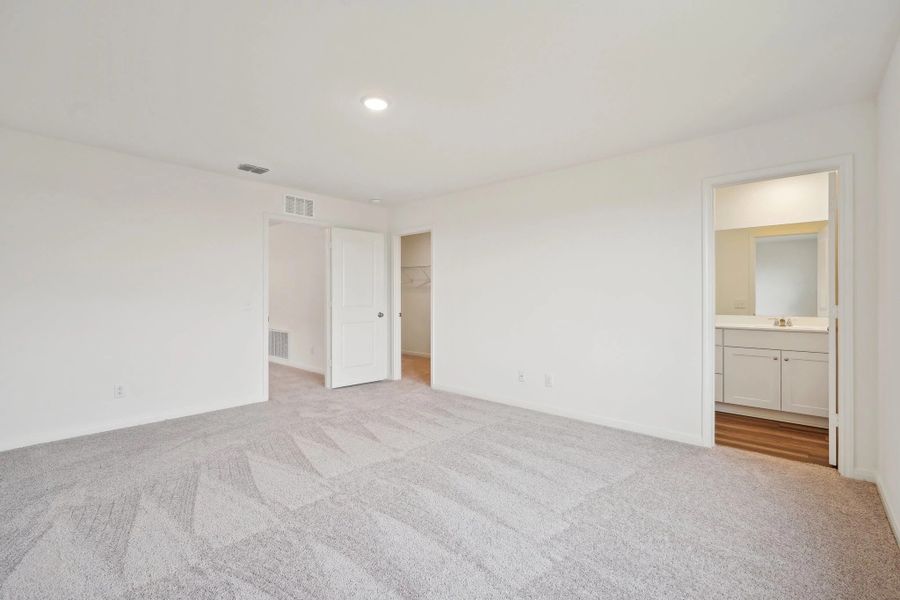 Representative unfurnished interior of a home built from the Barnard by Starlight Homes in The Wilder, Adkins (Image 17).