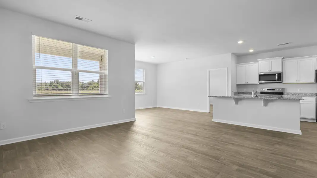 Spacious, unfurnished interior of a new home in The Ranch, Holly Hill (Image 22).