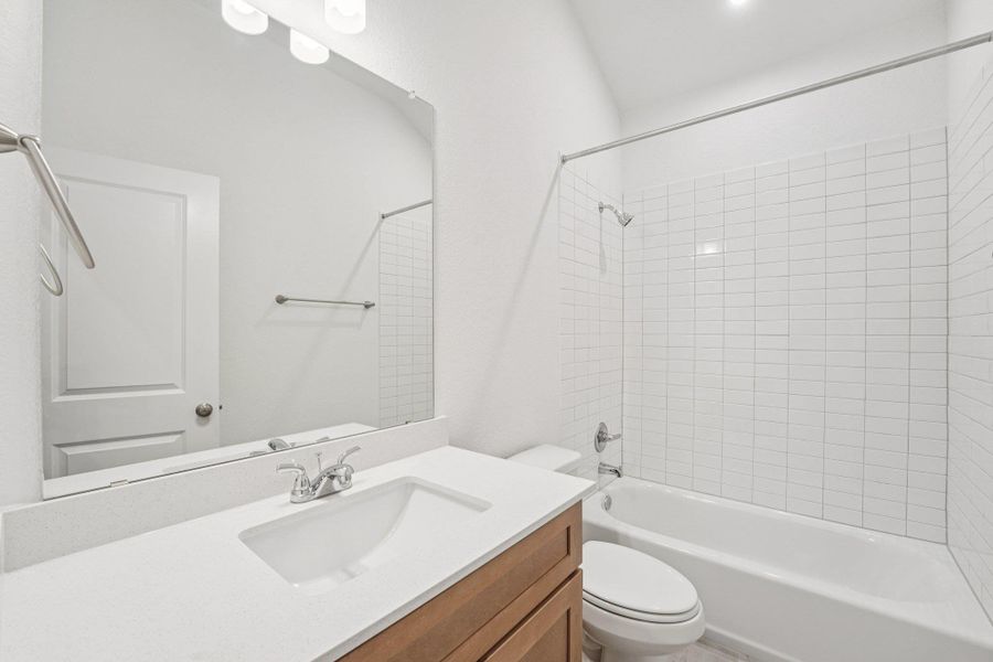 Furnished interior view inside a new home in Crosswinds, Kyle (Image 11).