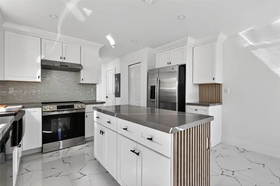 Furnished interior view inside a new home in , Miami (Image 15).