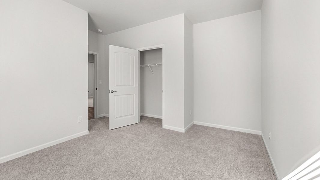Representative unfurnished interior of a home built from the Denton by D.R. Horton in Liberty Crossing, Braselton (Image 29).