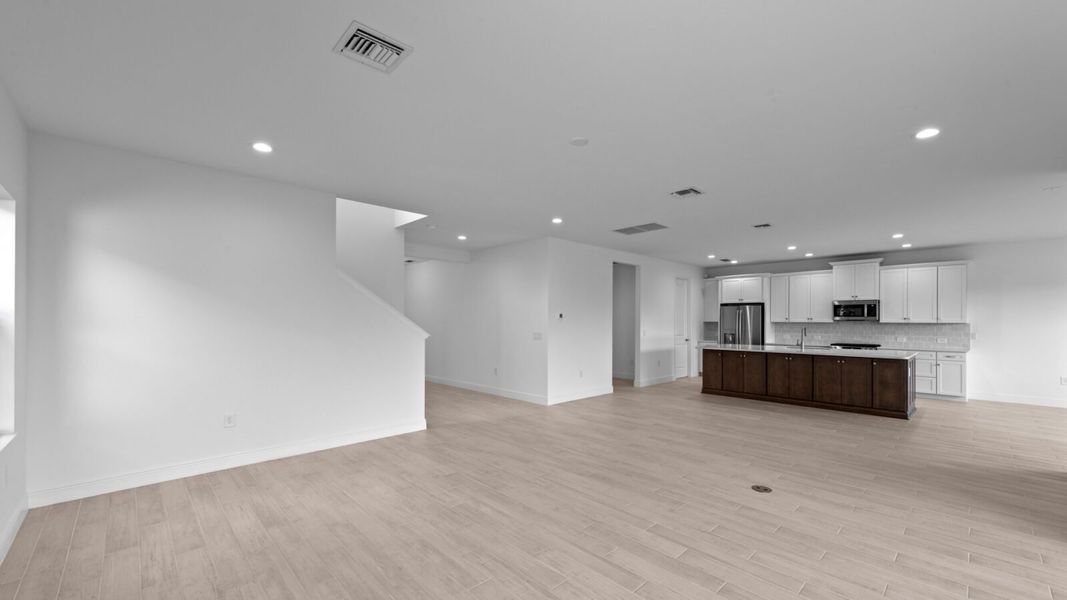 Spacious, unfurnished interior of a new home in SkySail, Naples (Image 18).