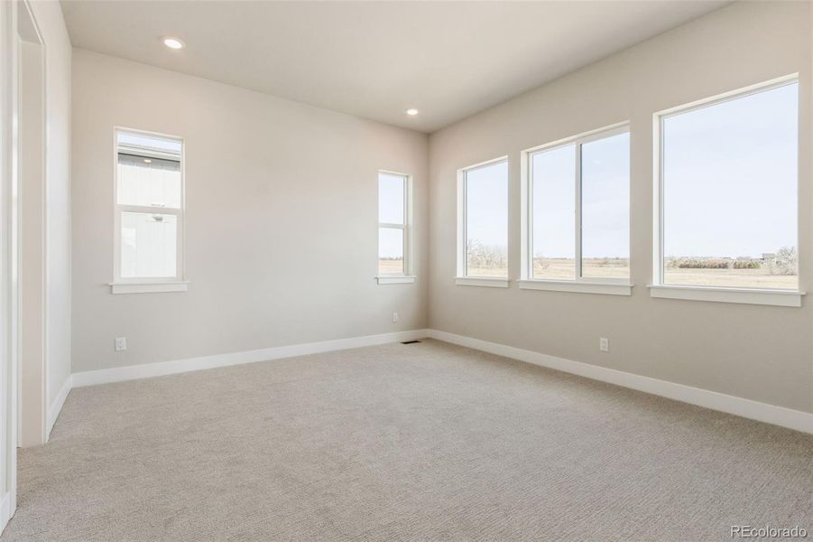 Spacious, unfurnished interior of a new home in Kitchel Lake at Serratoga Falls, Timnath (Image 23).