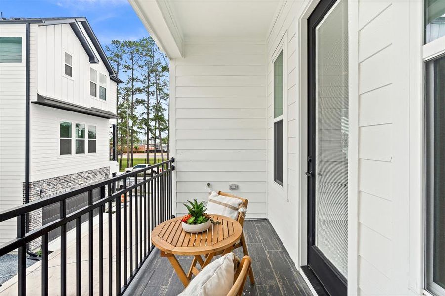 An oversized front covered balcony is a great way to enjoy the outdoors.