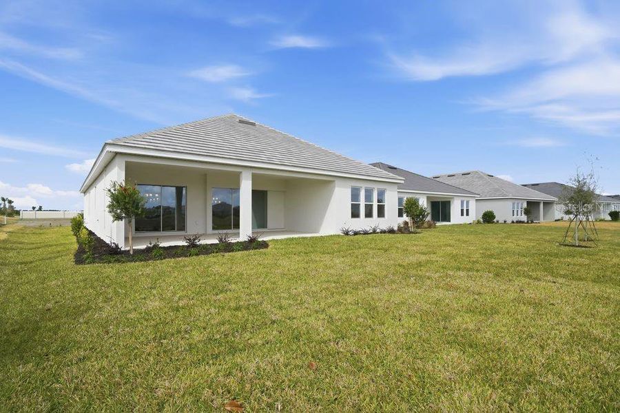 Exterior details and patio area of a home in Coasterra Community Group Page, Palmetto (Image 4).