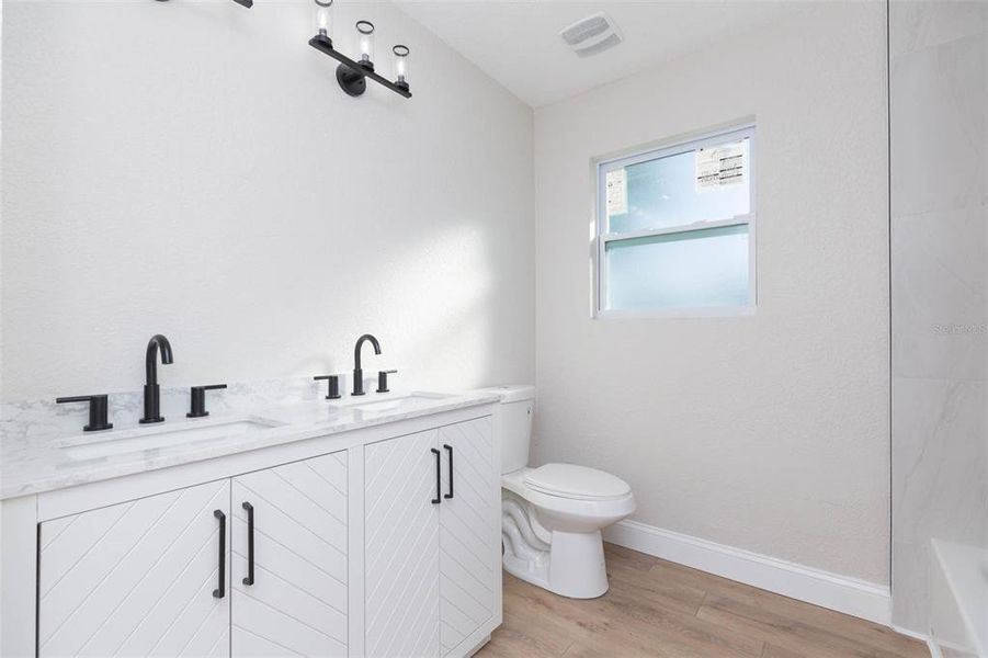 Furnished interior view inside a new home in , Dade City (Image 11).