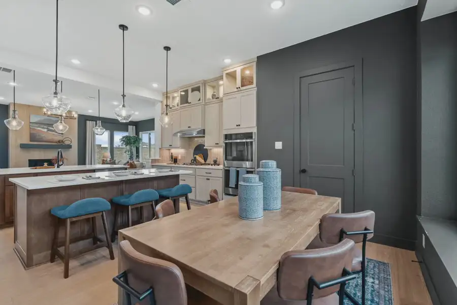 Representative furnished interior of a home built from the Acadia by Chesmar Homes in Elyson 50's, Katy (Image 7).