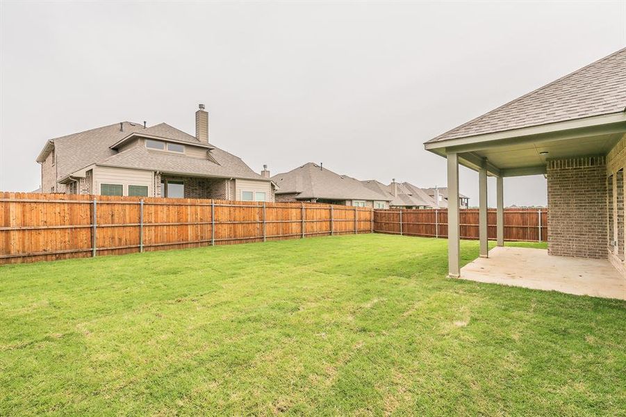 Front exterior of a new home in , Alvarado, TX, highlighting curb appeal (Image 1).