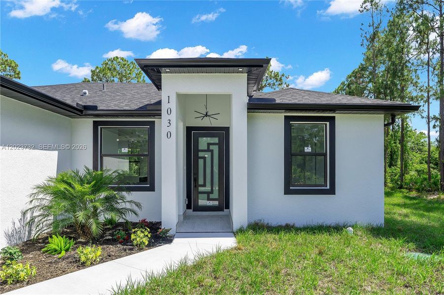 Exterior details and patio area of a home in , Lehigh Acres (Image 32).