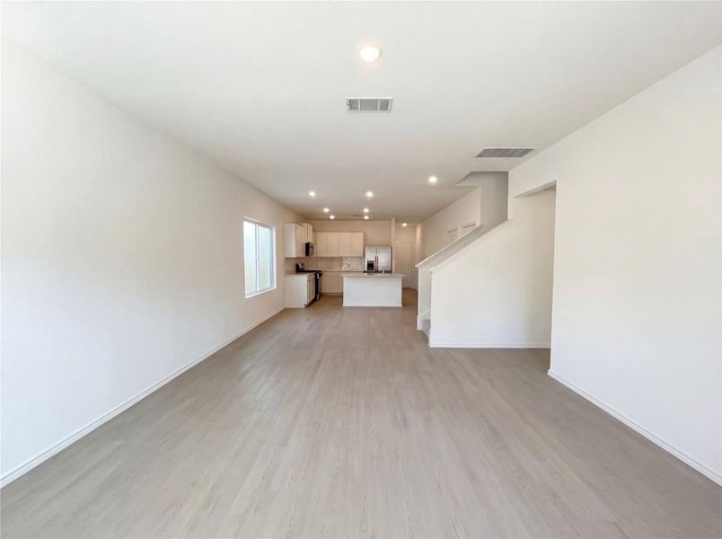 Spacious, unfurnished interior of a new home in The Colony, Bastrop (Image 30).