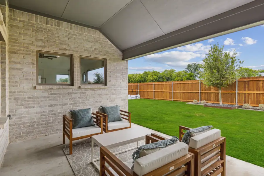 Patio in the Gilmour home plan by Trophy Signature Homes – REPRESENTATIVE PHOTO