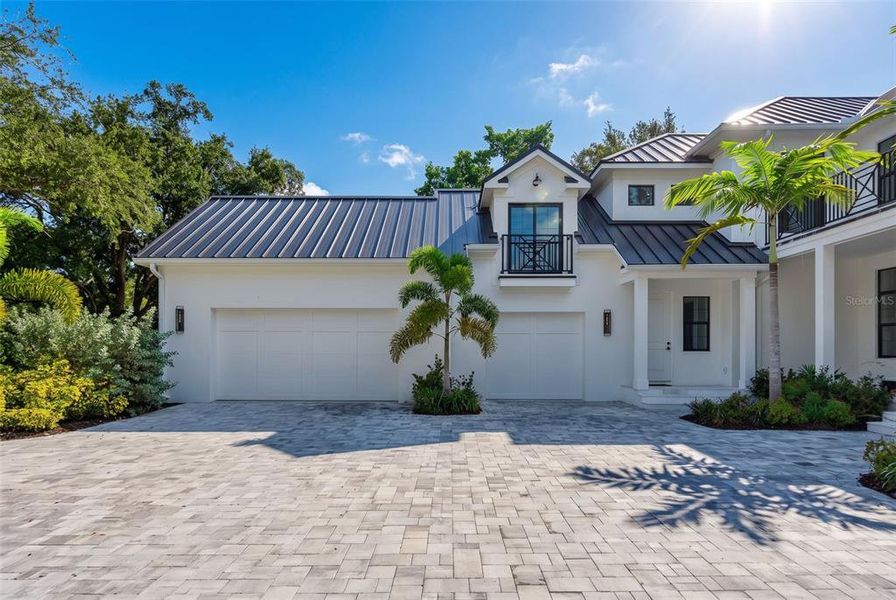 Front exterior of a new home in , Sarasota, FL, highlighting curb appeal (Image 25). Front exterior of a new home in , Sarasota, FL, highlighting curb appeal (Image 25).