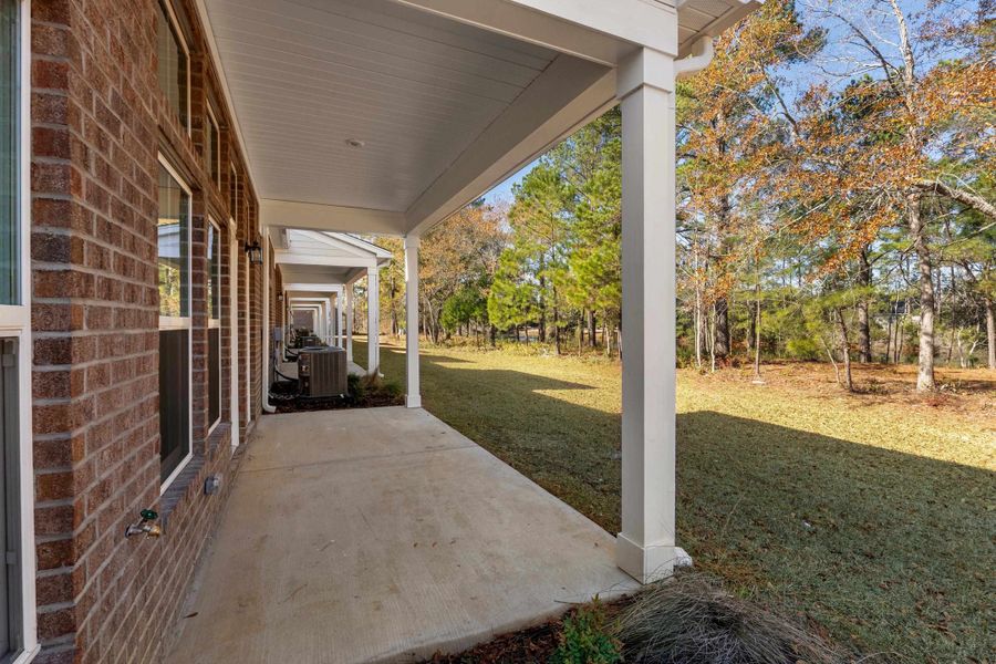 Exterior details and patio area of a home in Long Bay Golf Club, Longs (Image 4).