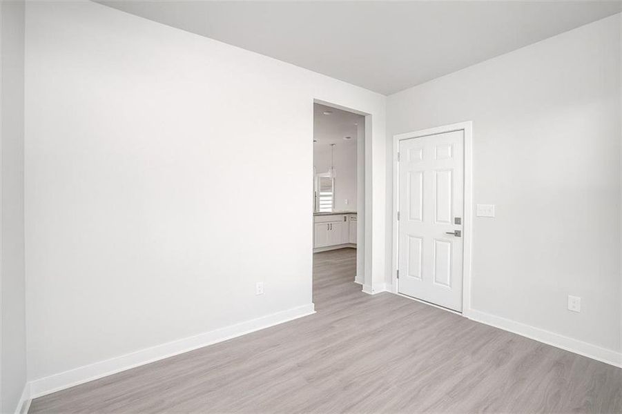 Spacious, unfurnished interior of a new home in The Cottages at East Lanier, Fayetteville (Image 6).