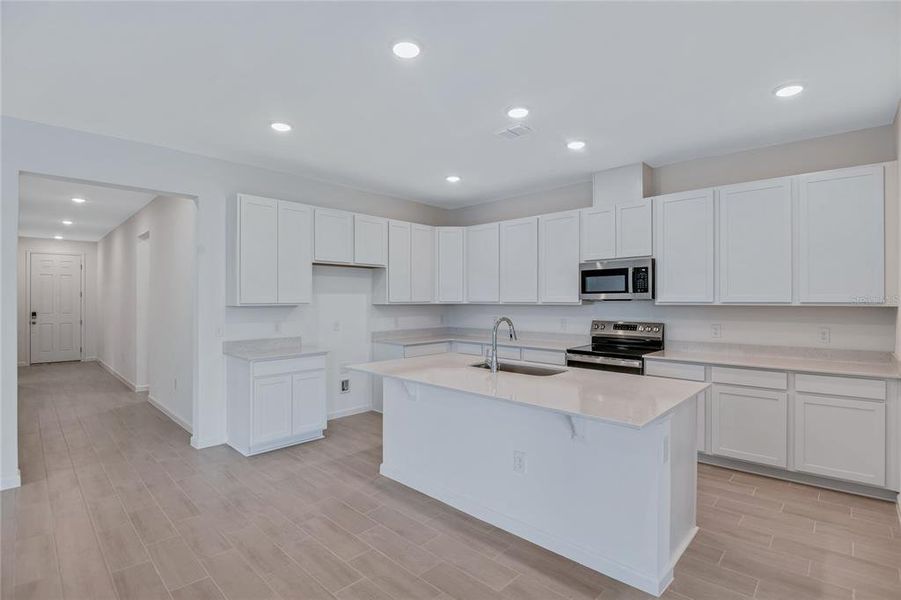 Furnished interior view inside a new home in , Winter Haven (Image 6). Furnished interior view inside a new home in , Winter Haven (Image 6).