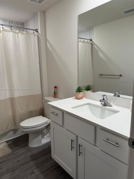 Furnished interior view inside a new home in , Port St. Lucie (Image 8).