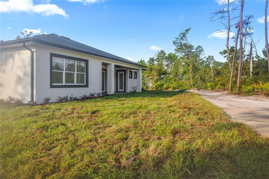 Exterior details and patio area of a home in , Eustis (Image 26). Exterior details and patio area of a home in , Eustis (Image 26).