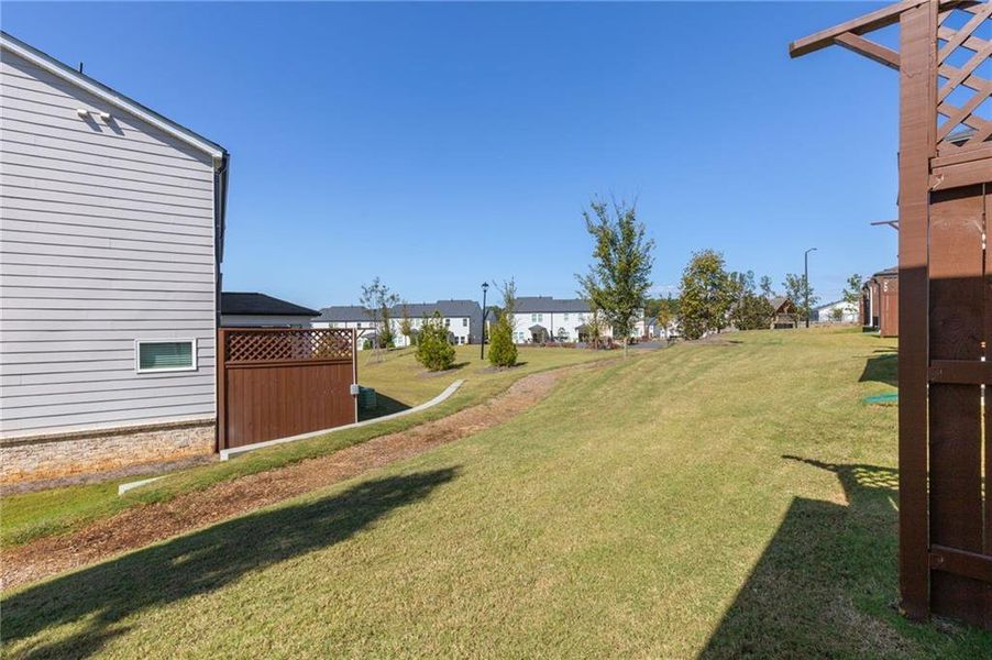 Exterior details and patio area of a home in Willowcrest Townhomes, Mableton (Image 29).