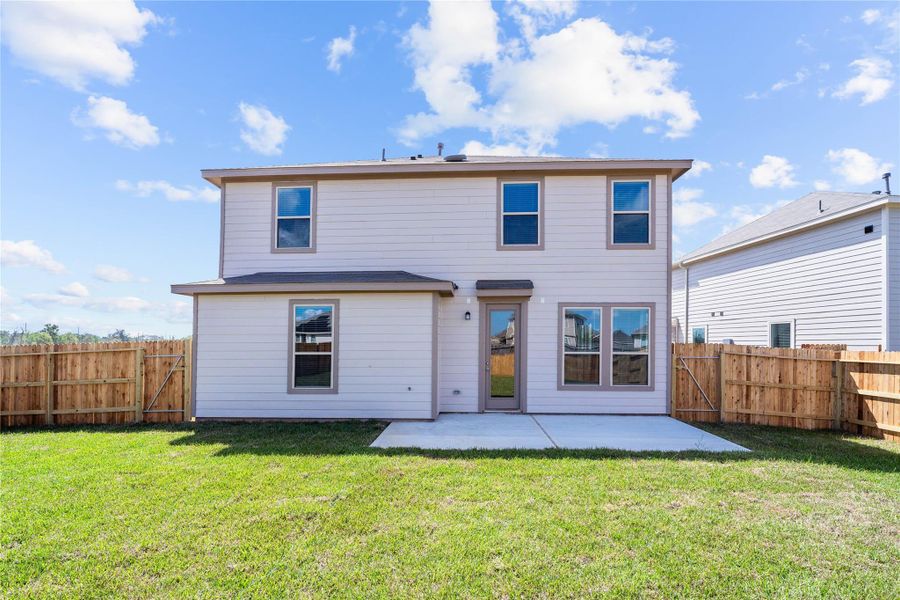 Come explore this expansive backyard featuring a large patio slab—perfect for outdoor living! There's ample space for kids to play and adults to unwind. Ideal for patio furniture, a BBQ pit, and so much more—the possibilities are endless! Come explore this expansive backyard featuring a large patio slab—perfect for outdoor living! There's ample space for kids to play and adults to unwind. Ideal for patio furniture, a BBQ pit, and so much more—the possibilities are endless!