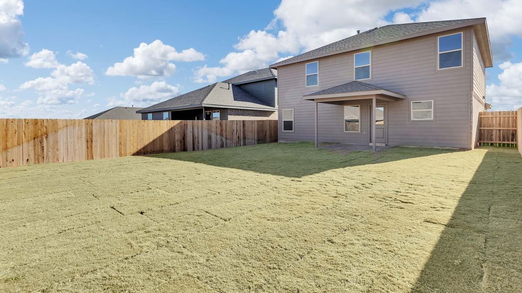 Exterior details and patio area of a home in Overlook West, Wolfforth (Image 4).