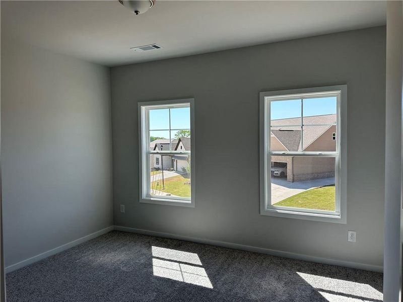 Spacious, unfurnished interior of a new home in Rosewood Lake Preserve, Hoschton (Image 31).
