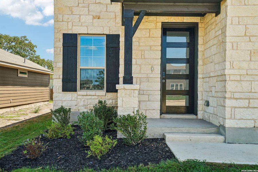 Exterior details and patio area of a home in Catalina, Converse (Image 29).