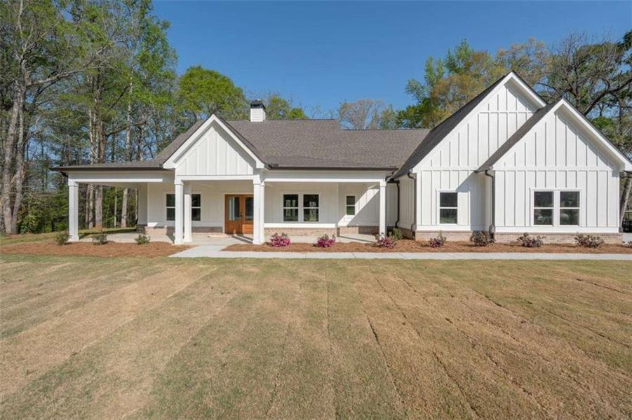Front exterior of a new home in , Covington, GA, highlighting curb appeal (Image 26).