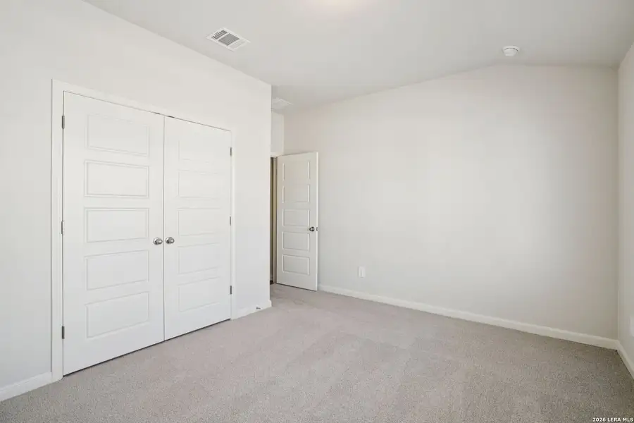Spacious, unfurnished interior of a new home in Estancia Ranch - Classic Series, San Antonio (Image 37).