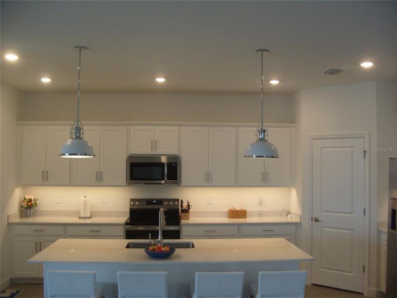 Furnished interior view inside a new home in , Port Charlotte (Image 30).
