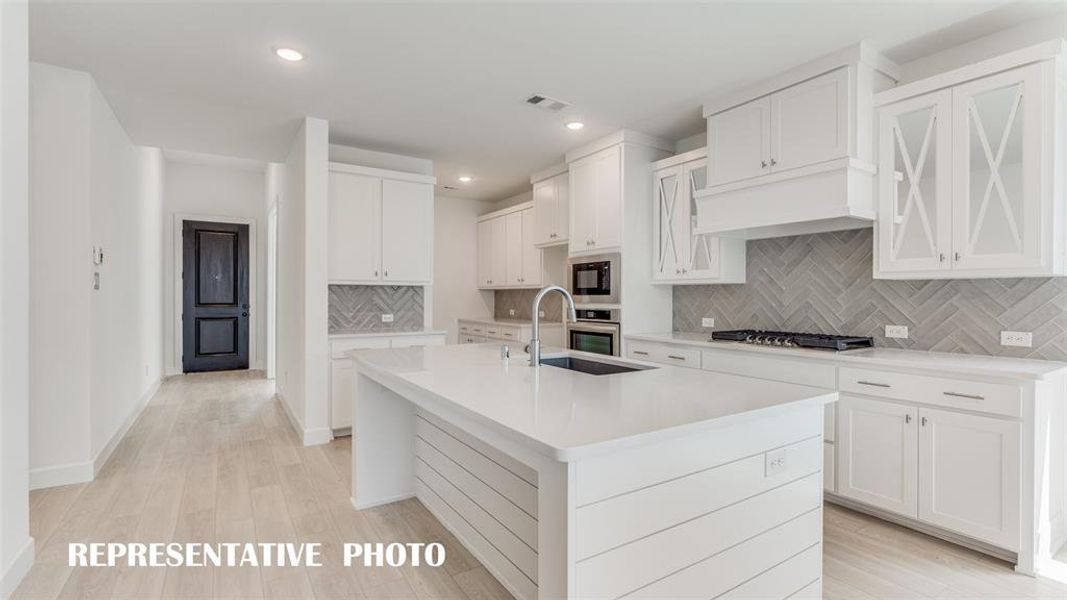 A dream kitchen filled with style and space!  REPRESENTATIVE PHOTO.