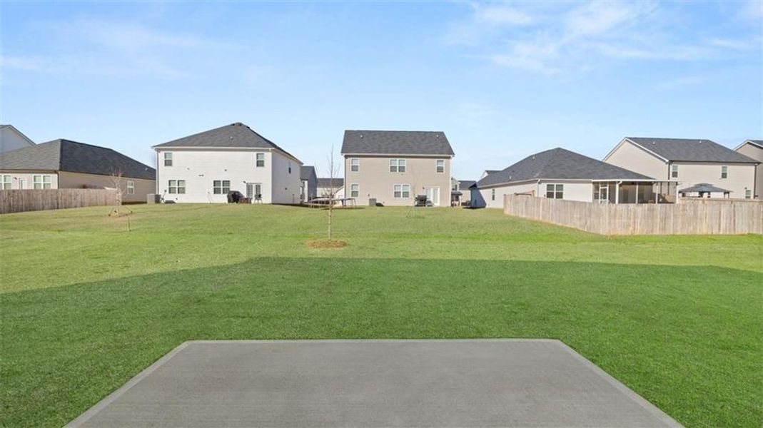 Exterior details and patio area of a home in The Preserve at Agricultural Village, Perry (Image 3).
