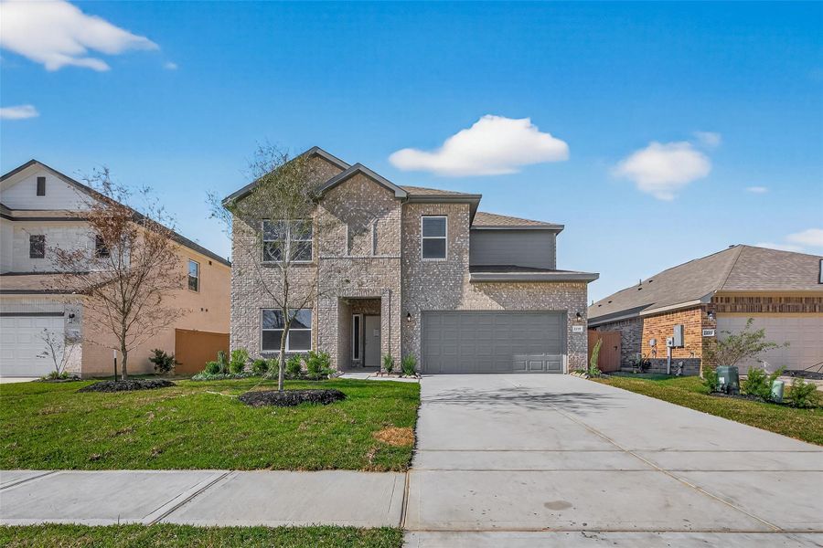 Front exterior of a new home in Lago Mar, Texas City, TX, highlighting curb appeal (Image 26).