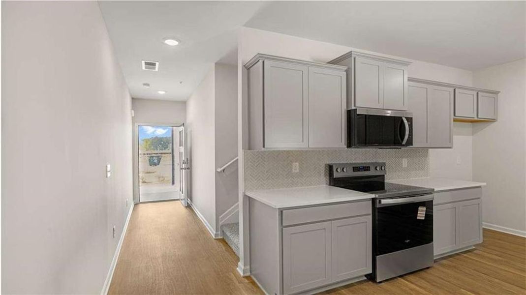 Furnished interior view inside a new home in Echo Glen, Stockbridge (Image 7).