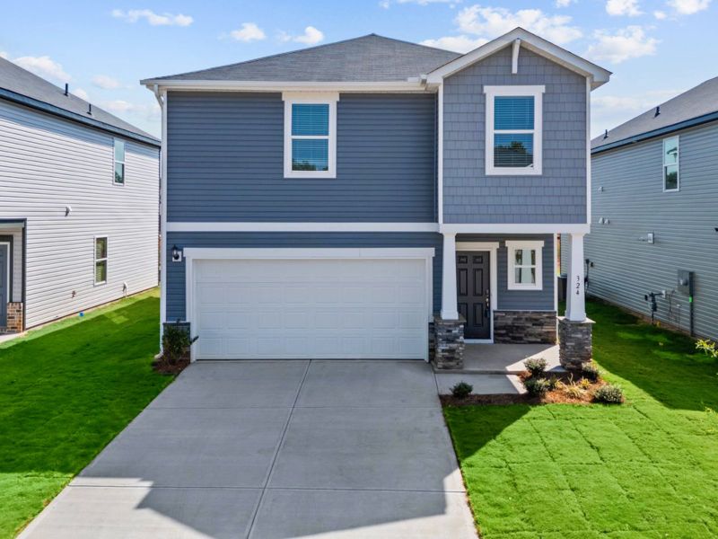 Front exterior of a new home in Pleasant Brook, Greenville, SC, highlighting curb appeal (Image 1).