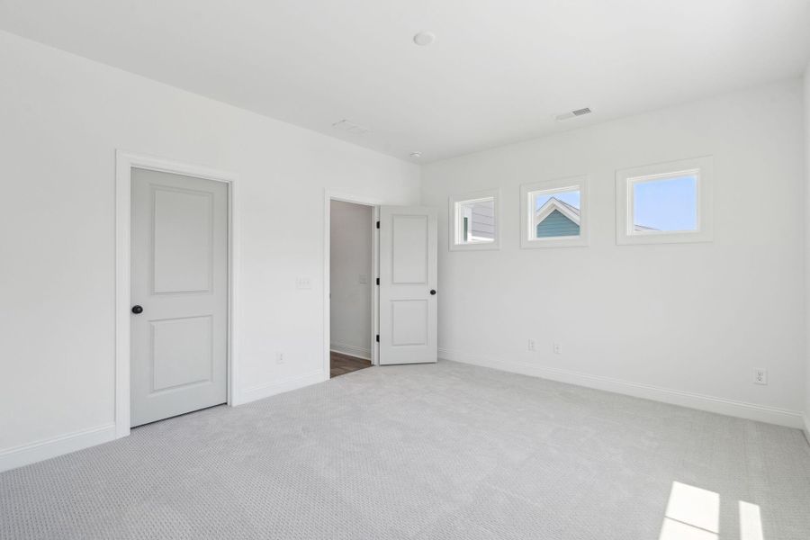 Spacious, unfurnished interior of a new home in The Domus Collection at Midtown Nexton, Summerville (Image 31).